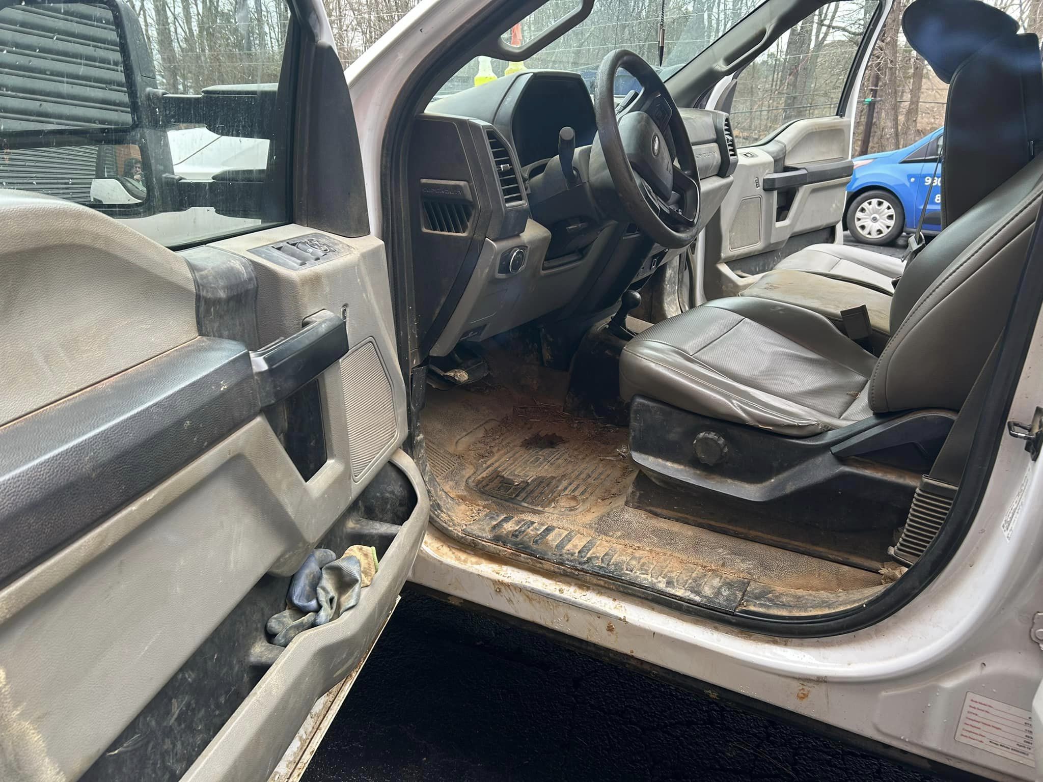 Heavily soiled truck interior before detailing